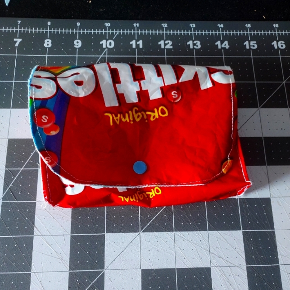 Eco friendly upcycled skittles clutch